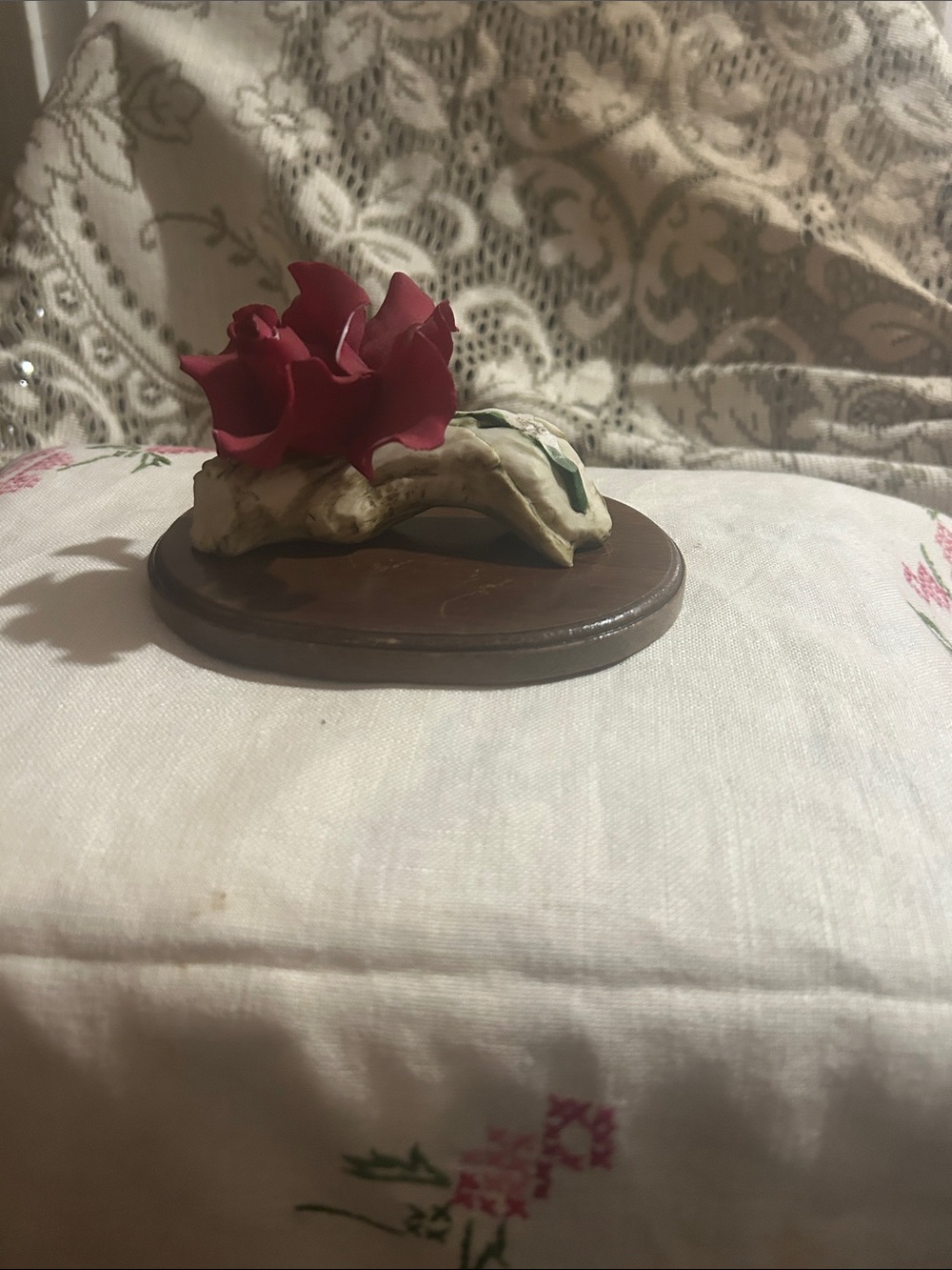 Saba ceramic flower figurine in red and cream on wooden base